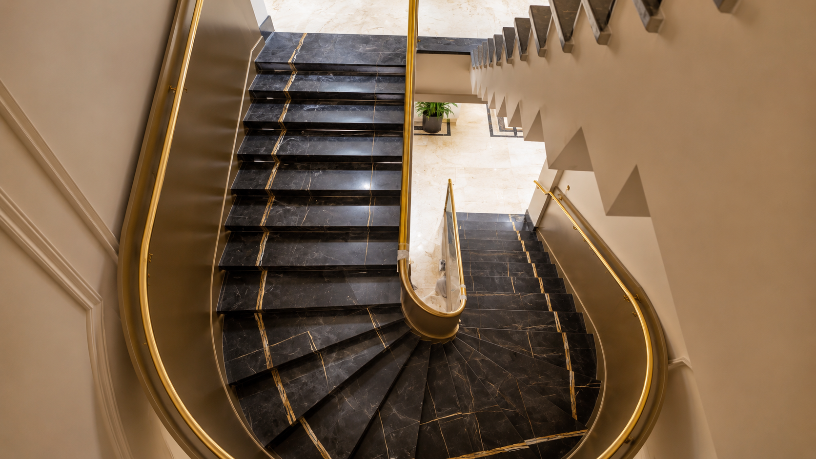 Luxury Gold Stainless Steel Staircase Railing with Black Marble Steps | Premium Interior Design