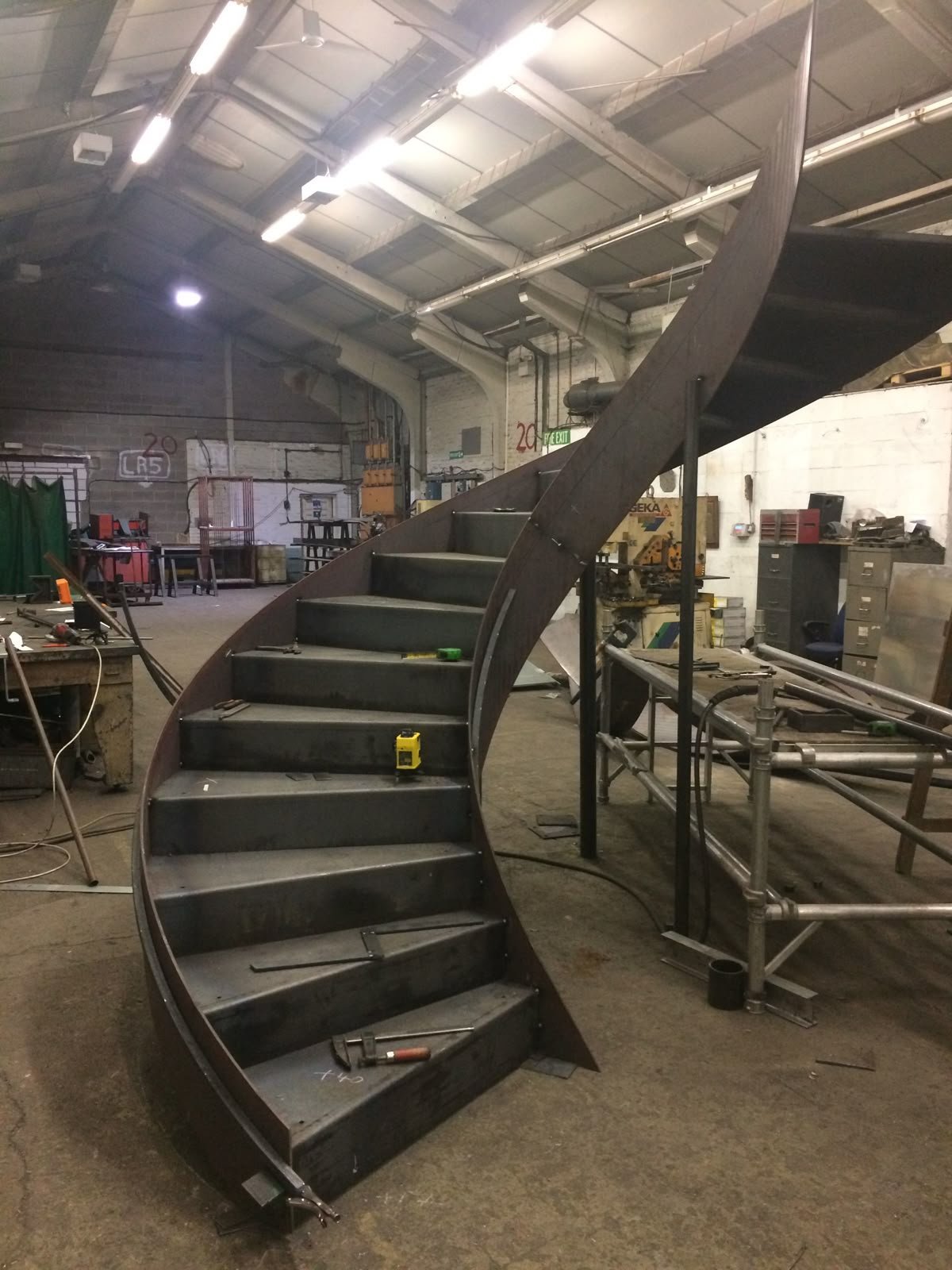 Modern Curved MS Staircase Fabrication & Installation in Delhi NCR