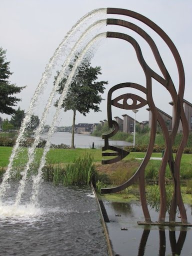 Artistic Metal Face Fountain Sculptures for Public & Garden Spaces